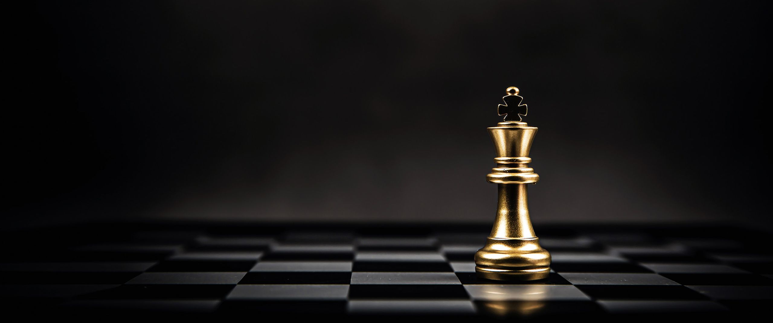 King,Golden,Chess,Standing,On,Chess,Board,Concept,Of,Business