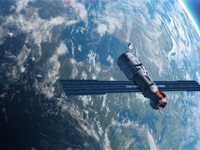 Illustration,With,An,Artificial,Satellite,In,Orbit,Around,The,Earth